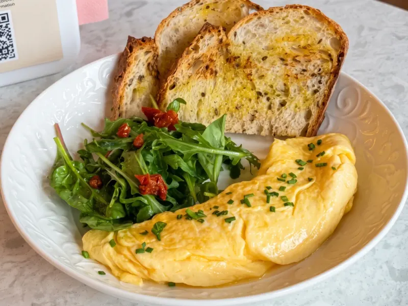 French Omelet with Salad and Sourdough Bread